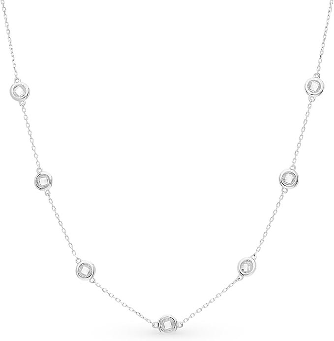 Discover timeless elegance with this delicate dimond necklace, featuring evenly spaced bezel-set round stones along a fine chain. Perfect for layering or wearing solo, this minimalist design adds a touch of sophistication to any outfit.